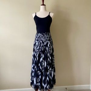 WHBM Long flowing sheer black and white skirt with elastic waistband. Size XS.